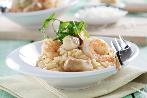 Risotto de setas, gambas y rúcula
